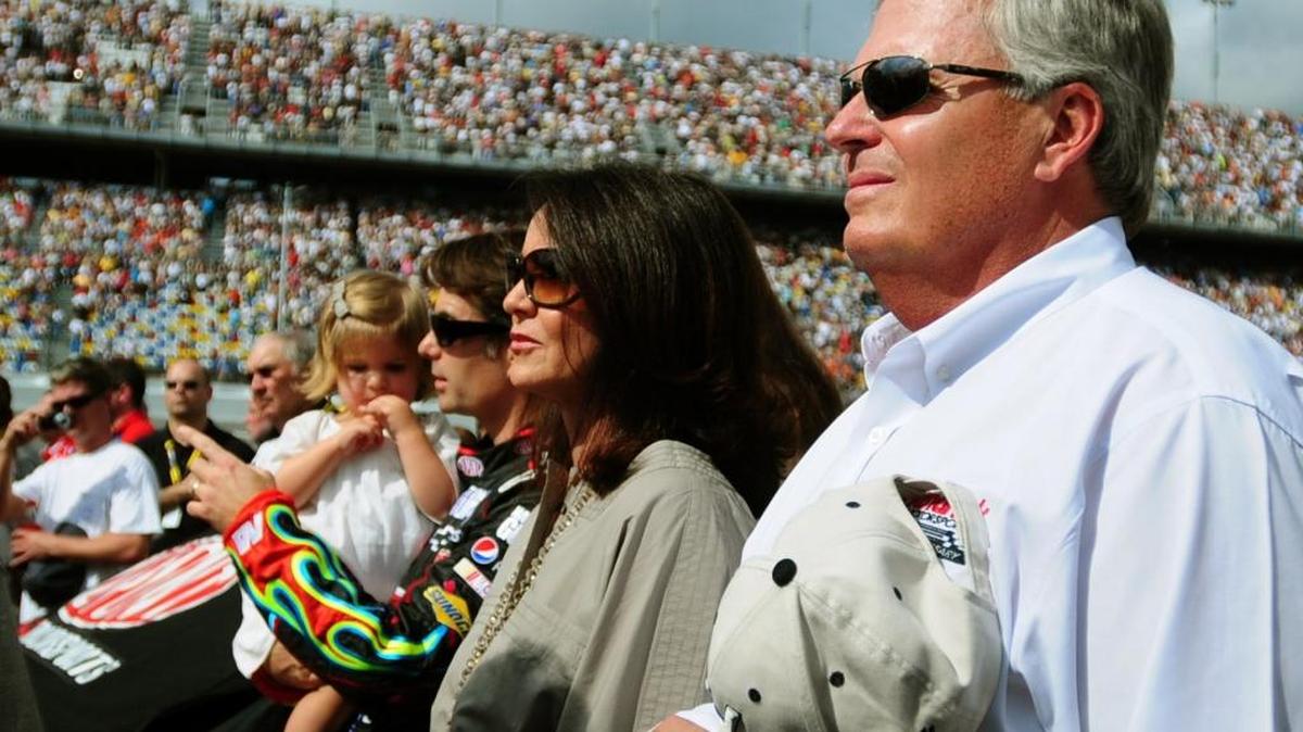 NASCAR team owner Rick Hendrick listens to the national anthem before a race at Daytona International Speedway in 2009.