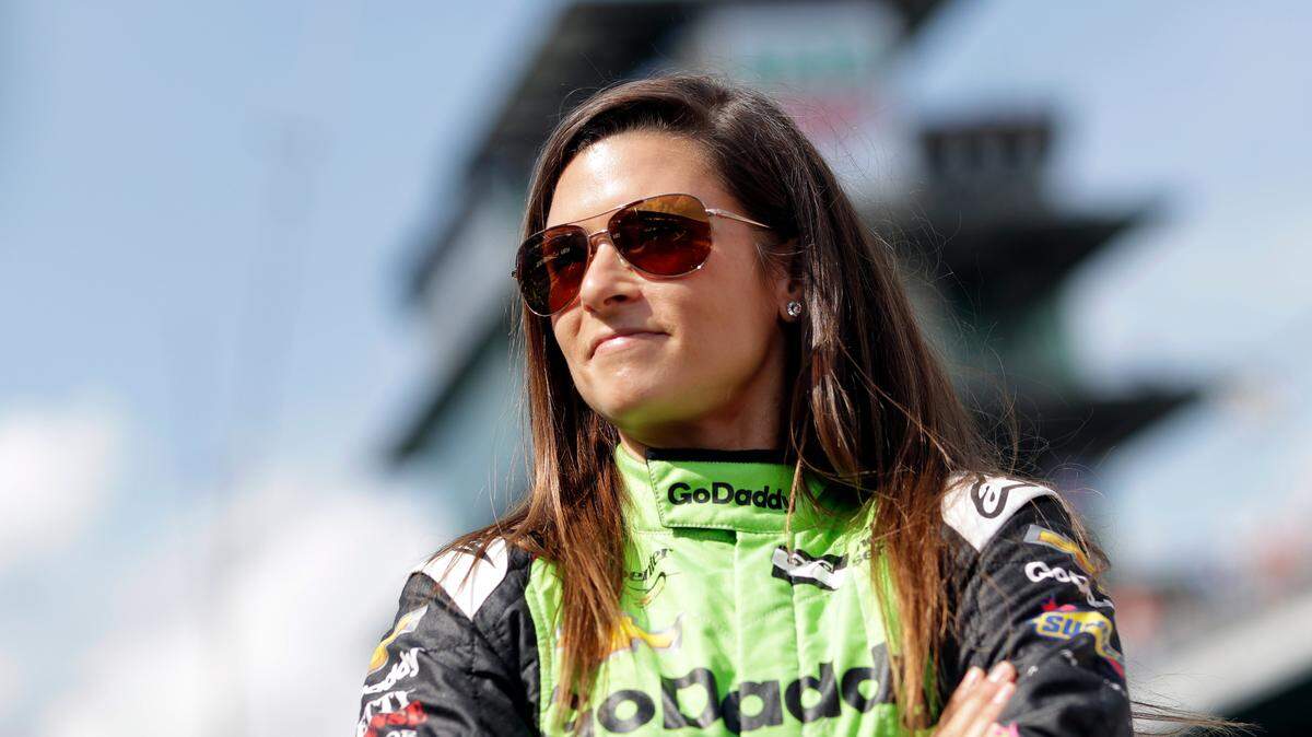FILE - In this Sunday, May 20, 2018, file photo, Danica Patrick waits during qualifications for the IndyCar Indianapolis 500 auto race at Indianapolis Motor Speedway in Indianapolis. Patrick will take her final trip in a race car, one last 500 miles around Indianapolis Motor Speedway, the biggest stage of her career.  (AP Photo/Darron Cummings, File)