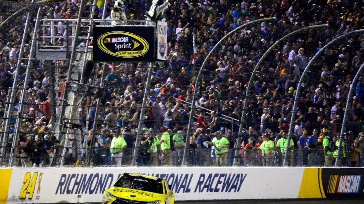 
Matt Kenseth takes the checkered flag to win Saturday’s NASCAR Sprint Cup Series Federated Auto Parts 400 at Richmond International Raceway in Richmond, Va.
