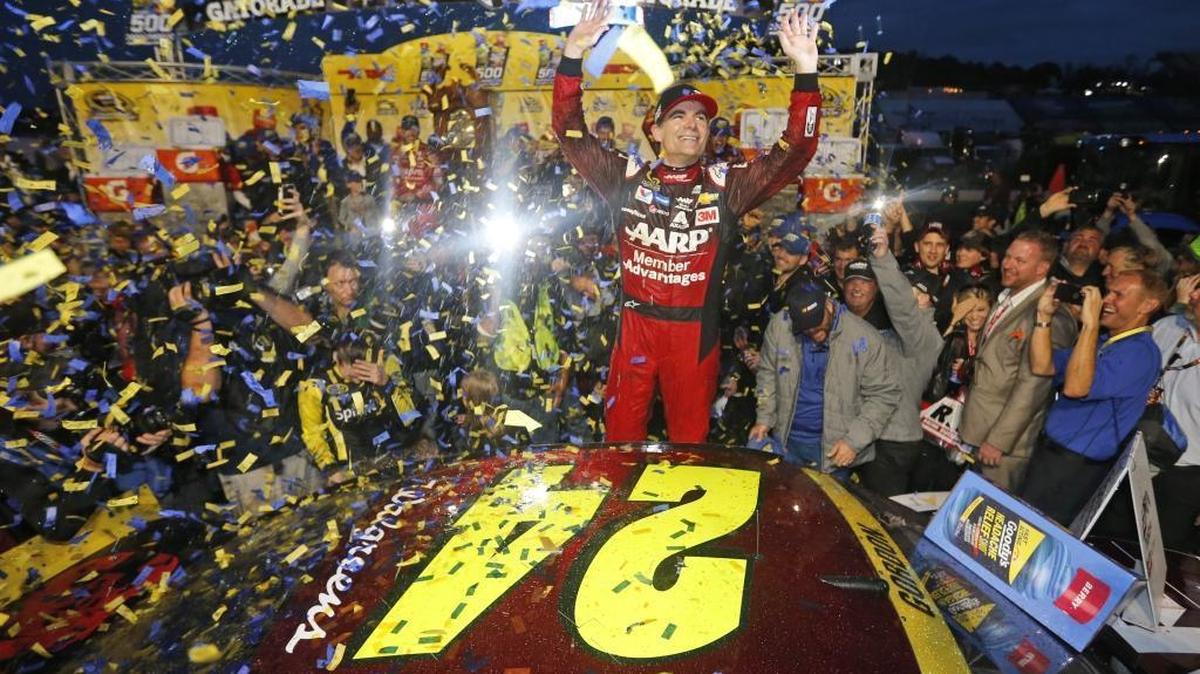 Jeff Gordon celebrates after winning Sunday’s Goody's 500 at Martinsville Speedway. Gordon, who is retiring after this season, will be one of four drivers racing for the Chase championship in the season finale Nov. 22 at Homestead-Miami Speedway.