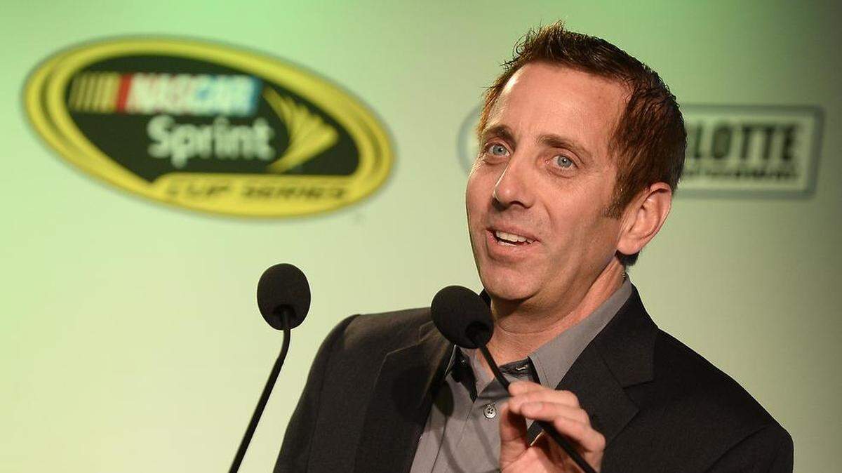 NASCAR Cup series driver Greg Biffle introduces team owner Jack Roush during the Charlotte Motor Speedway Media Tour in January 2015 at the Charlotte Convention Center. Biffle’s ex-wife, Nicole Biffle, will receive $250,000 for being secretly filmed at the couple’s mansion on Lake Norman in Mooresville, NC.