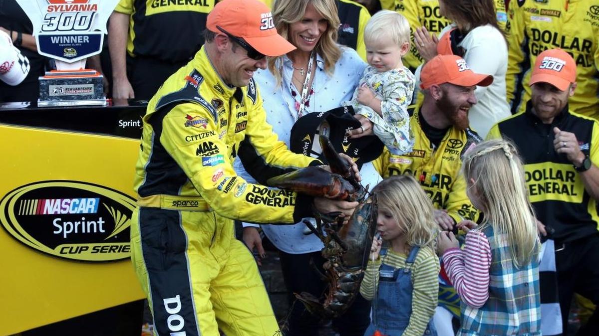 
Matt Kenseth celebrates in Victory Lane with his wife Katie and daughters Clara, Kaylin and Grace after winning Sunday’s SYLVANIA 300 at New Hampshire Motor Speedway.

