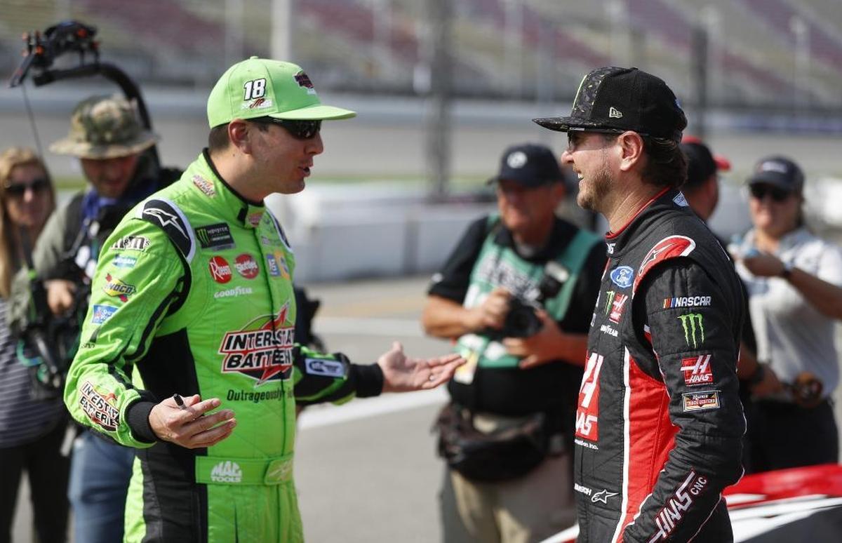 After Saturday night’s win, Kyle (left) and Kurt Busch are now the first brothers in NASCAR history with 30 wins apiece.
