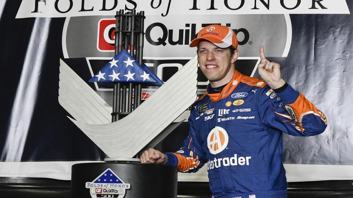 Brad Keselowski, who passed Kyle Larson for the lead with seven laps remaining, celebrates after winning Sunday’s NASCAR Cup series race at Atlanta Motor Speedway in Hampton, Ga.