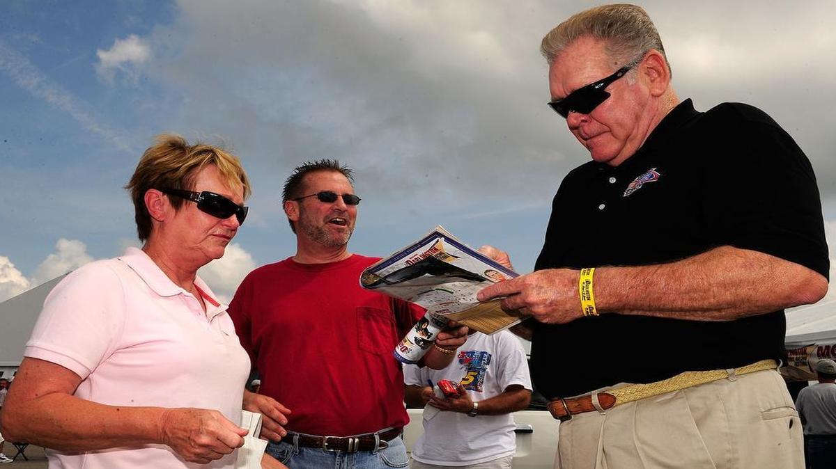 
Former NASCAR driver Buddy Baker (right) found fame on the track and off, as a television and radio personality. Now he faces inoperable lung cancer with the same courage he showed on the track. 
