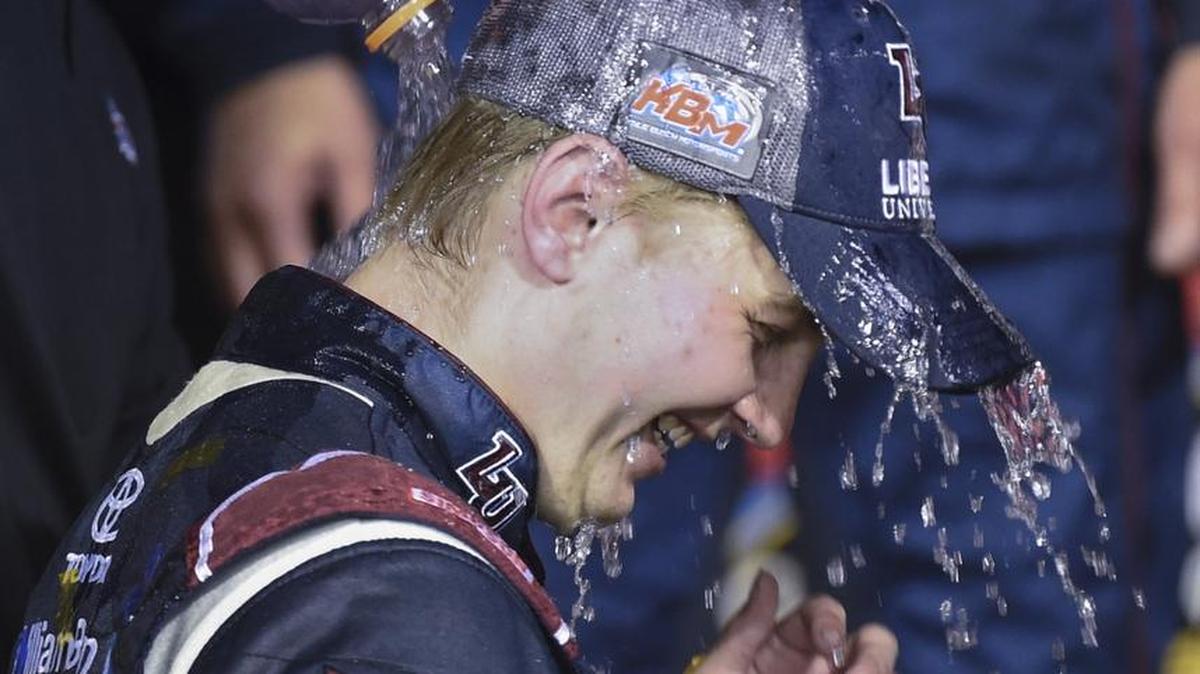 Driver William Byron is doused by a teammate after winning last week’s NASCAR Truck series race at Kansas Speedway.