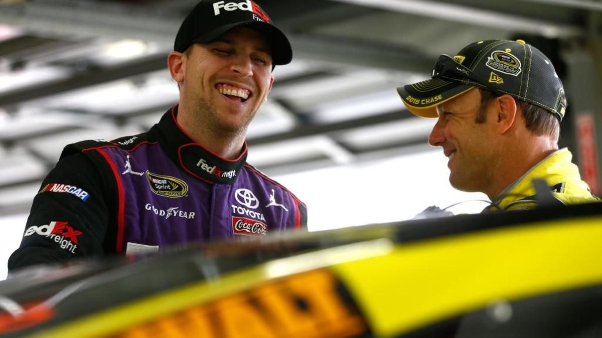 
Denny Hamlin, left, talks with Matt Kenseth in the garage area  at New Hampshire Motor Speedway last week. 

