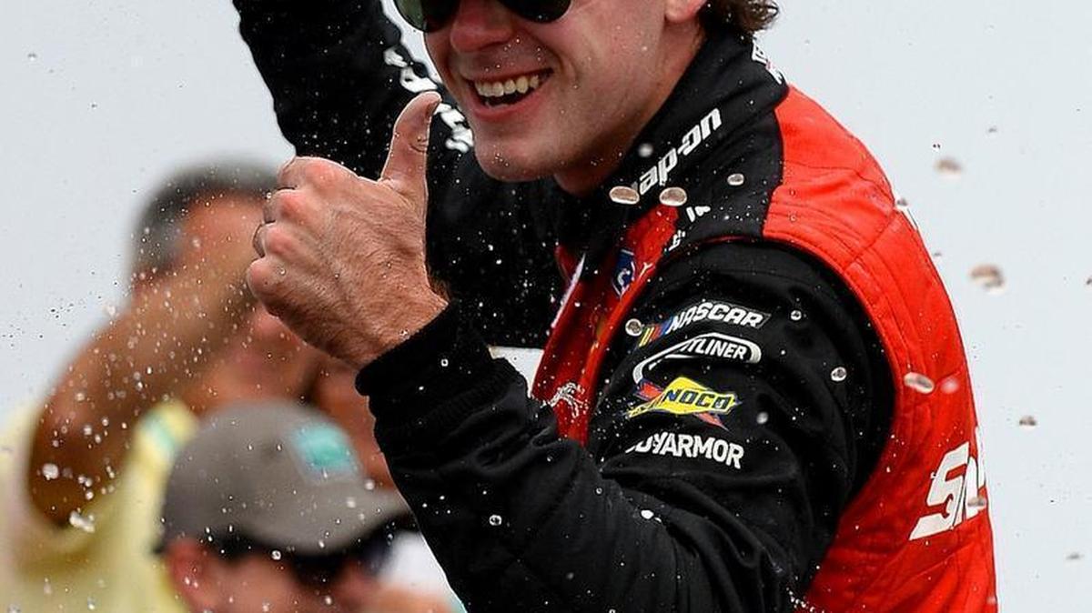 NASCAR Xfinity Series driver Ryan Blaney celebrates winning Saturday’s Hisense 4K TV 300 at Charlotte Motor Speedway.