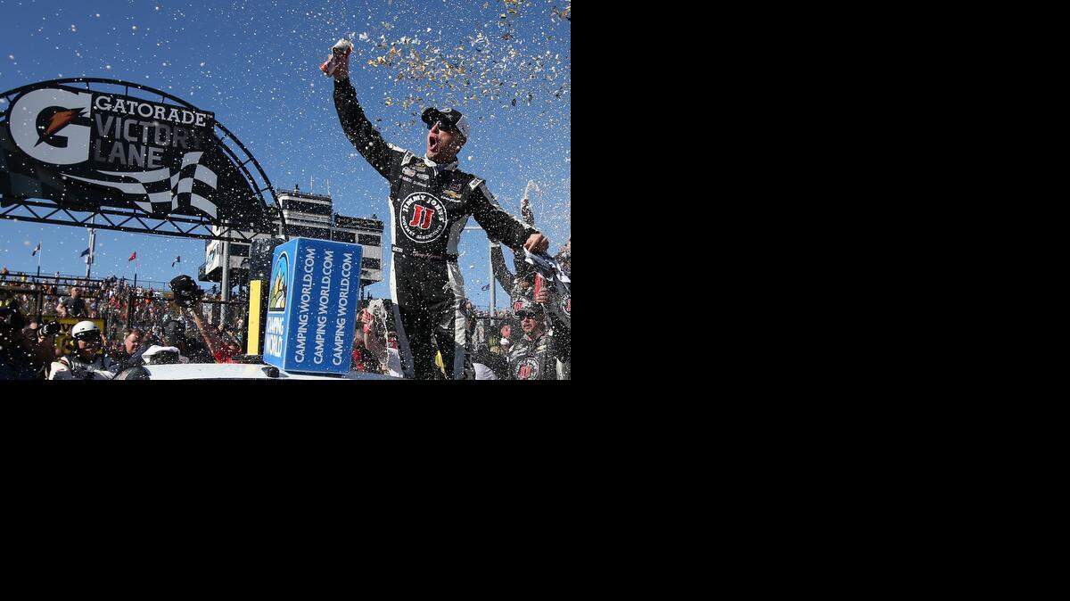 
Kevin Harvick celebrates in victory lane after winning the NASCAR Sprint Cup Series CampingWorld.com 500 at Phoenix International Raceway on Sunday, March 15, 2015 in Avondale, Ariz. 

