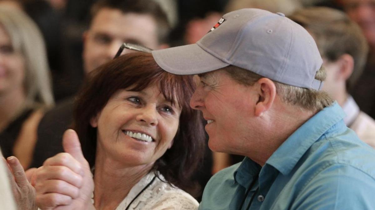 Driver Ron Hornaday, right, and his wife Lindy, left, react to Hornaday being named as a member of the NASCAR Hall of Fame class of 2018 on Wednesday.