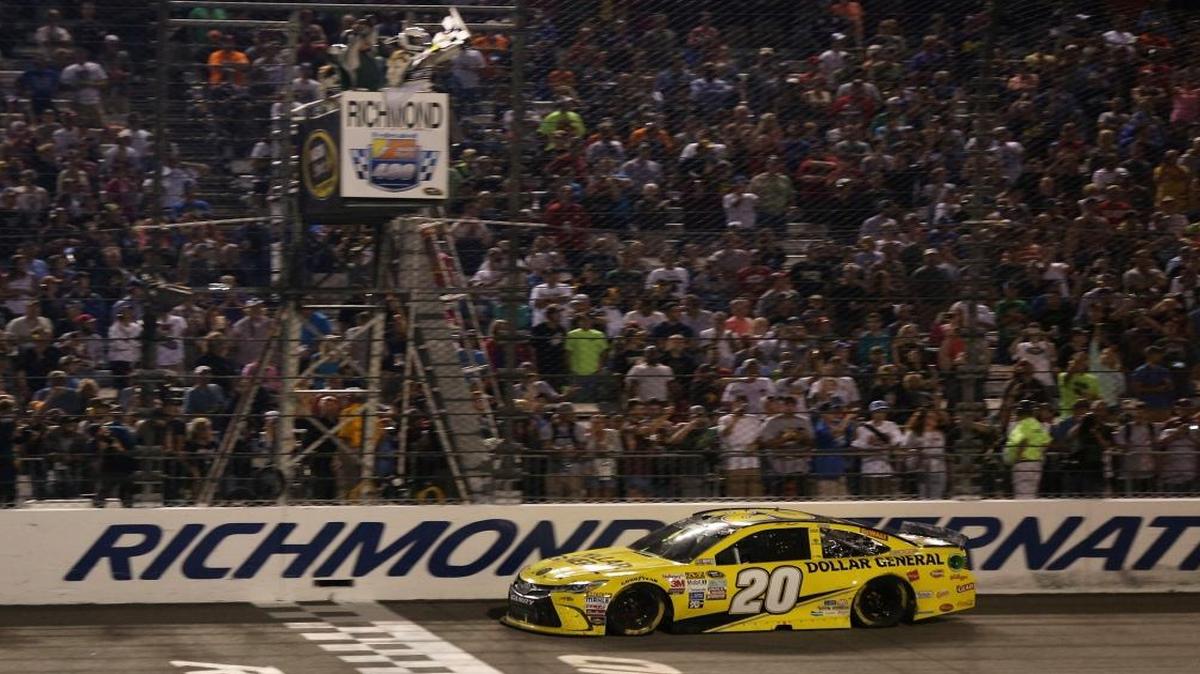 
Matt Kenseth, driver of the No. 20 Toyota, takes the checkered flag to win the NASCAR Sprint Cup Series Federated Auto Parts 400 at Richmond International Raceway on Saturday. It marks the ninth time in the past 15 races a Joe Gibbs Racing driver has won. 

