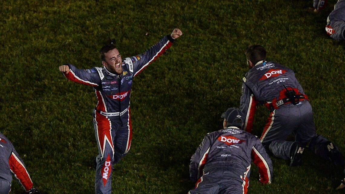 NASCAR driver Austin Dillon led his team in doing a head first slide into the infield grass as they celebrate winning the Coca-Cola 600 at Charlotte Motor Speedway on Monday, May 29, 2018.