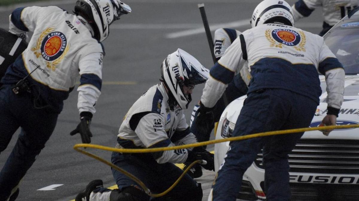 Brad Keselowski’s crew works on his car during the 2015 Sprint All-Star Race.