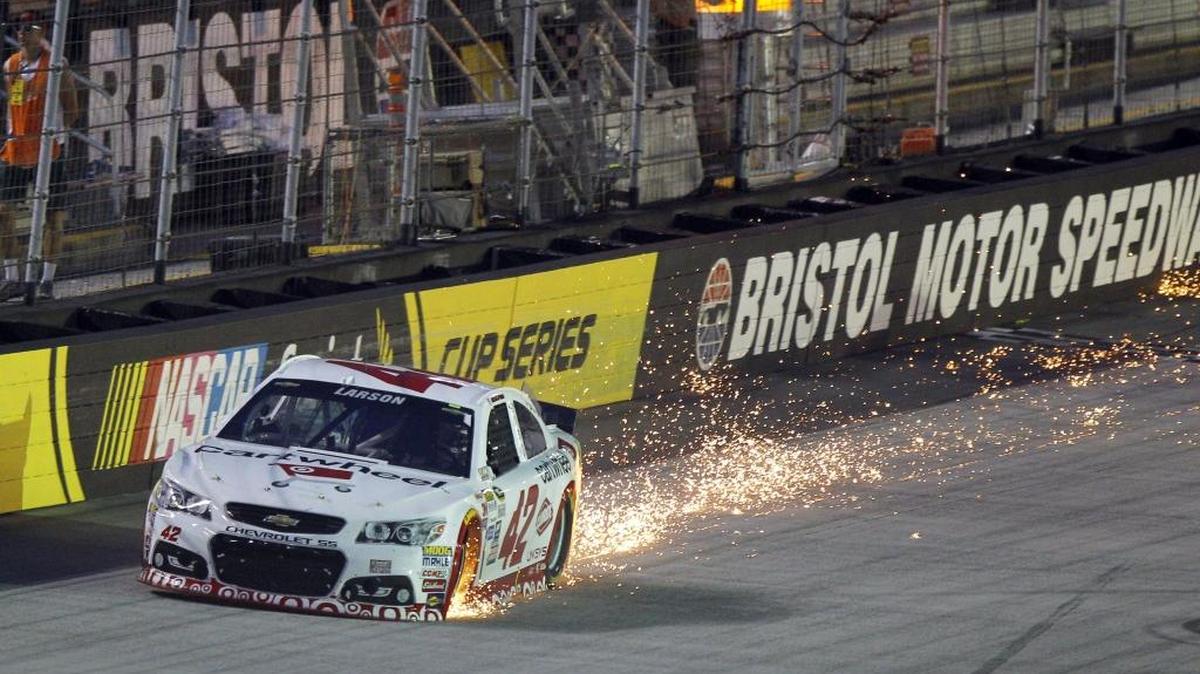 
Sparks trail from Kyle Larson's car during the NASCAR Sprint Cup Series auto race, Aug. 22, 2015, in Bristol, Tenn.
