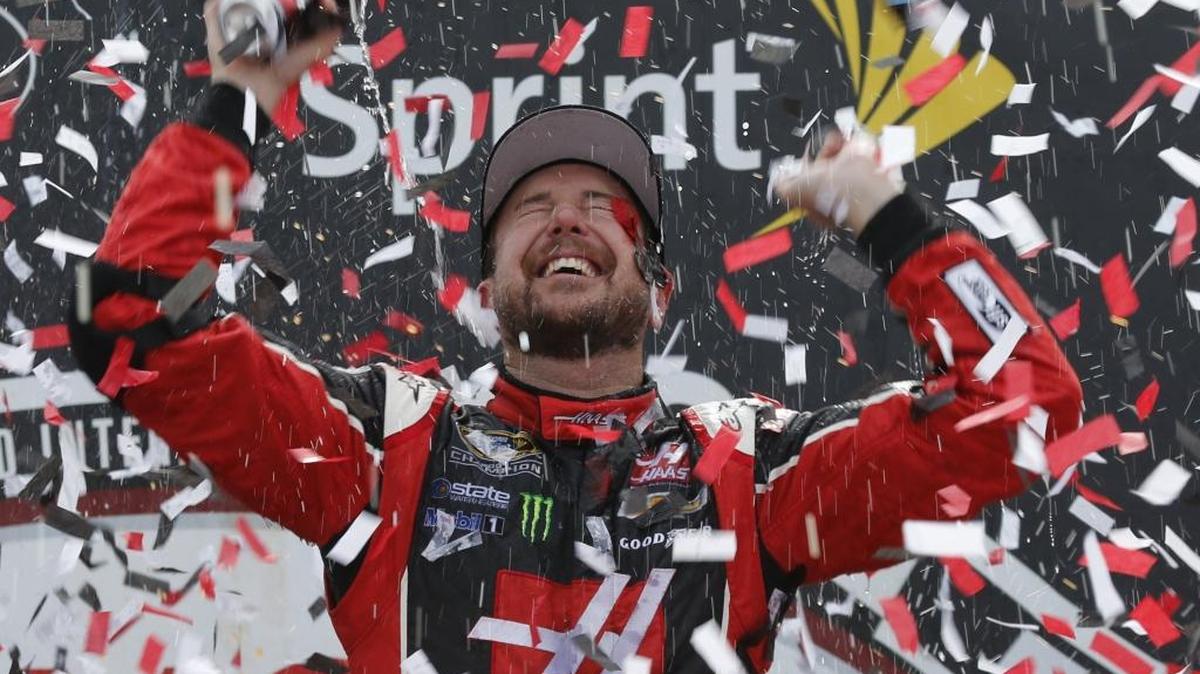Kurt Busch celebrates after winning the NASCAR Sprint Cup auto race at Richmond International Raceway in Richmond, Va., on April 26, 2015.