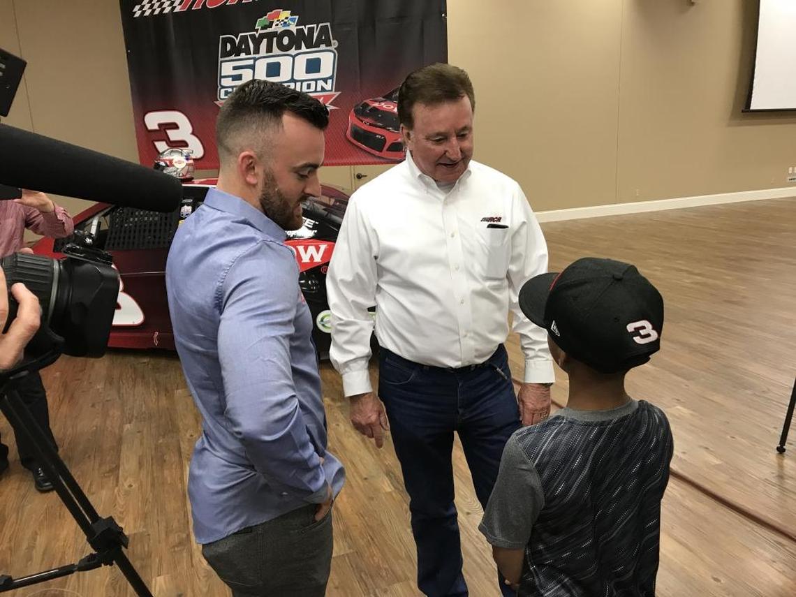 Austin Dillon, left, and Richard Childress, center, finally met Jordan, the boy who gave Dillon a lucky penny before his Daytona 500 win, at Richard Childress Racing on Wednesday.