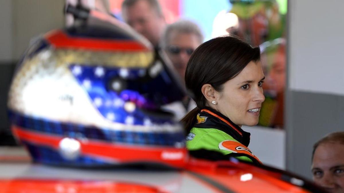 NASCAR Sprint Cup Series driver Danica Patrick (10) relaxes in the garage as she waits for the start of practice on Friday at Daytona International Speedway in Daytona Beach, Fla.