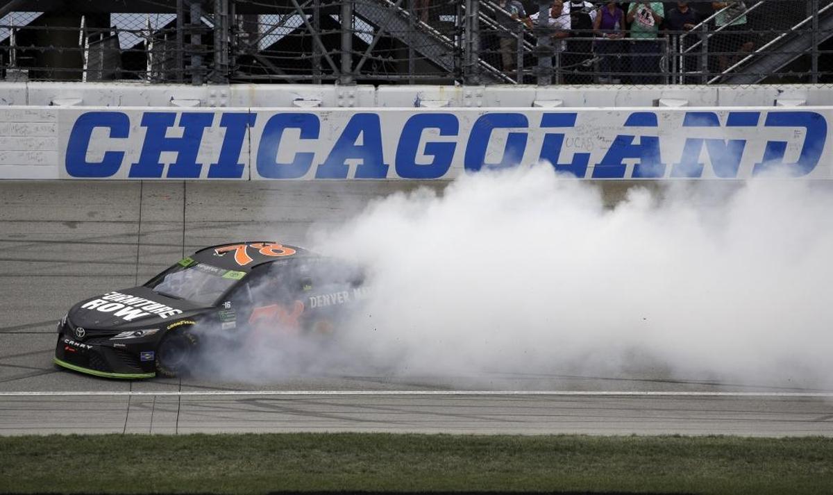 Martin Truex Jr. finished almost eight seconds ahead of runner-up Chase Elliott, who won Stage 2, at Chicagoland.