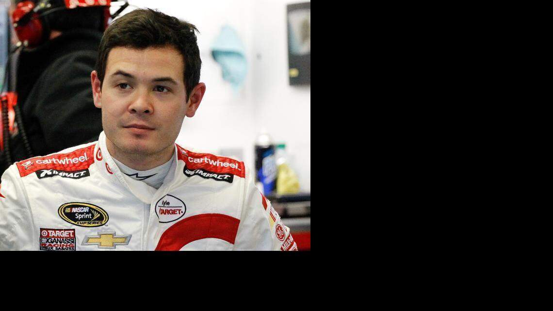 
Driver Kyle Larson stands in the garage during a practice session for a NASCAR Sprint Cup Series auto race at Daytona International Speedway in Daytona Beach, Fla. Larson will not race at Martinsville Speedway on Sunday, March 29, 2015, failing to get medical clearance after fainting during an autograph session. The team said in a statement Sunday that Larson remains at Carolina’s Medical Center in Charlotte for more testing. 
