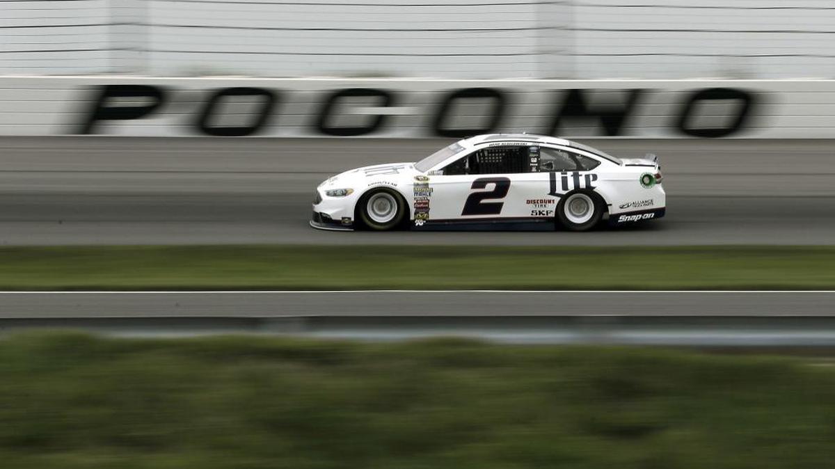 Brad Keselowski drives through Turn 3 during qualifying for Sunday's NASCAR Sprint Cup Series auto race, Friday in Long Pond, Pa. Keselowski won the pole.