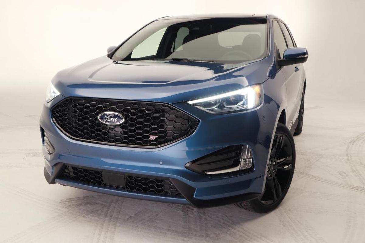 This Friday, Jan. 5, 2018, photo shows the new 2019 Ford Edge ST on display in Warren, Mich. It's the company's first SUV tuned by the Ford Performance team responsible for the GT supercar, Focus RS and F-150 Raptor.