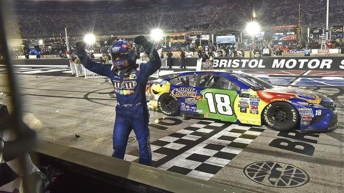 Kyle Busch celebrates after winning Saturday’s NASCAR Cup Series auto race in Bristol, Tenn.
