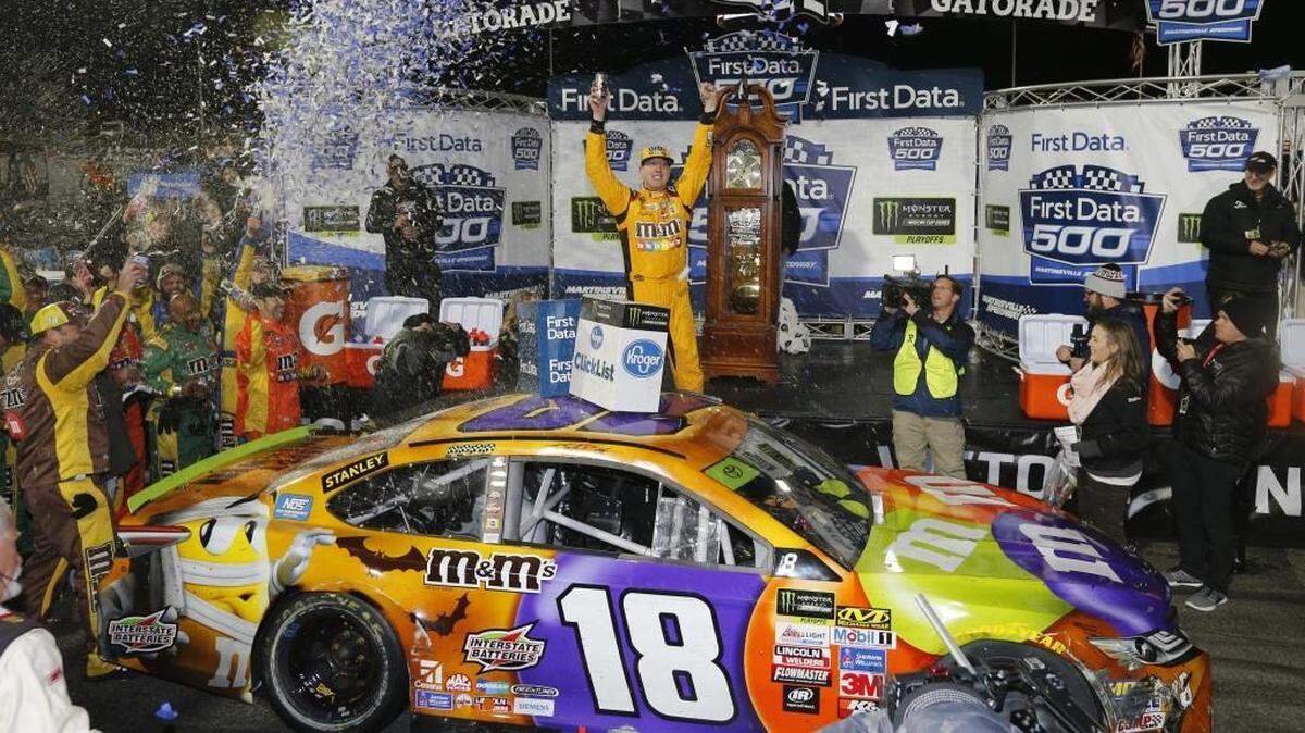 Kyle Busch advanced to the NASCAR Cup Series championship race by virtue of his win Sunday at Martinsville Speedway, where he won the race as a pileup formed behind him.