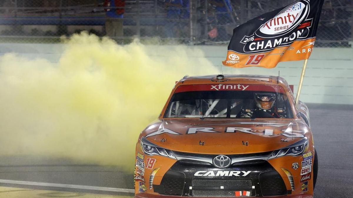 Daniel Suarez does a burnout after winning the Ford EcoBoost 300 during Championship Weekend at Homestead-Miami Speedway on Saturday.