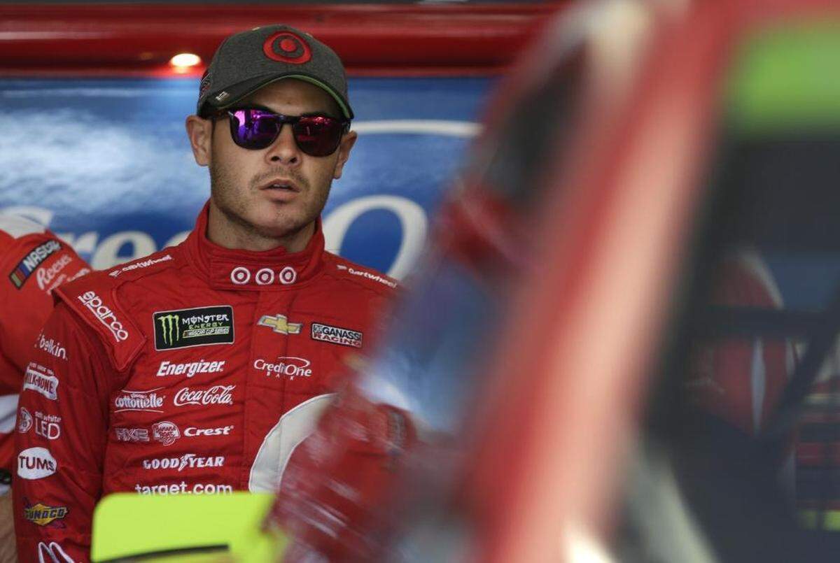 Kyle Larson, above, is currently third in the Cup Series playoffs standings behind Kyle Busch and leader Martin Truex Jr.