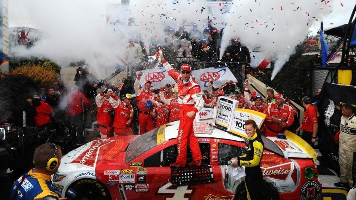 
Kevin Harvick, driver of the #4 Budweiser/Jimmy John's Chevrolet, celebrates in victory lane after winning the NASCAR Sprint Cup Series AAA 400 at Dover International Speedway on October 4, 2015 in Dover, Delaware.
