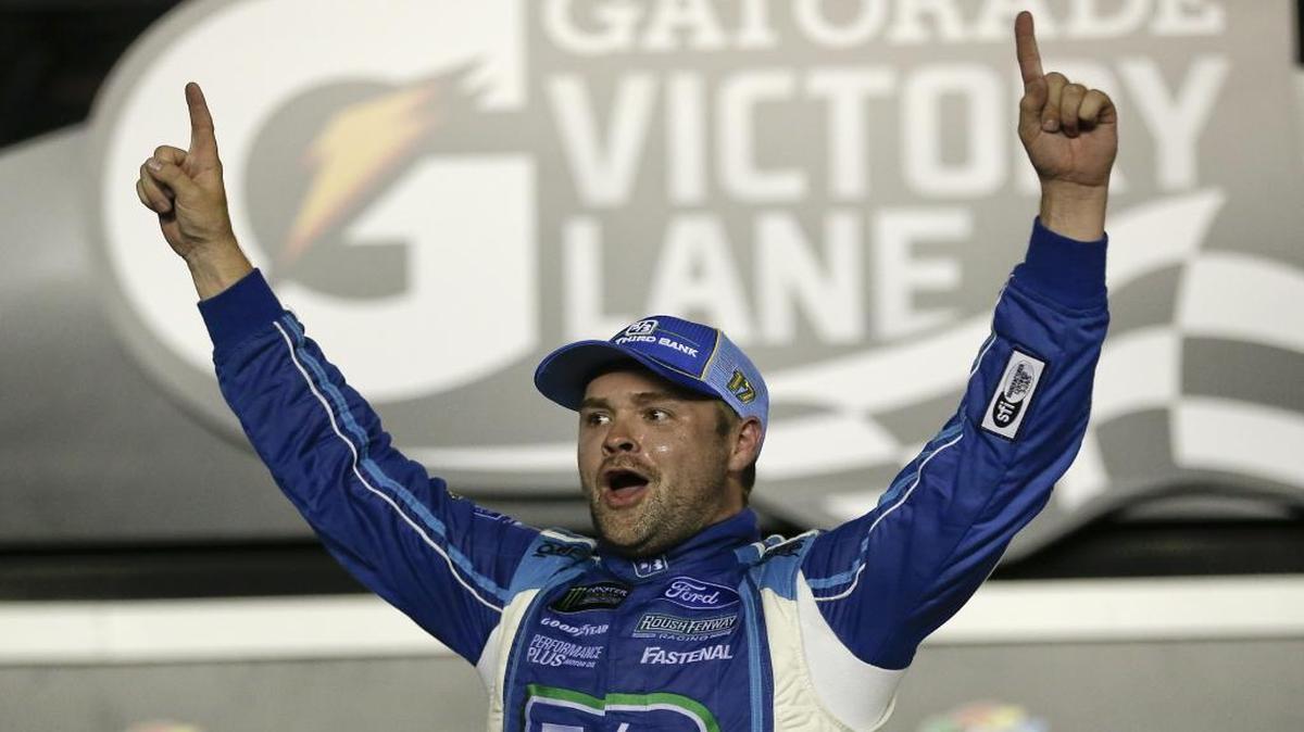 Ricky Stenhouse Jr. celebrates in Victory Lane after winning Saturday’s NASCAR Cup auto race at Daytona International Speedway in Daytona Beach, Fla.