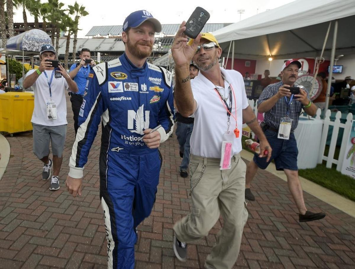 On down days at the track, mingling with fans can make a driver move beyond their frustrations, Dale Earnhardt Jr., left, said this week.