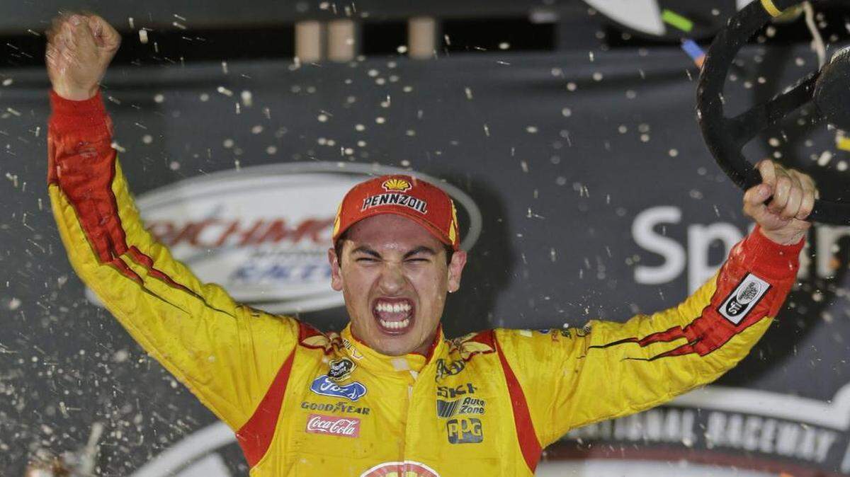 
Joey Logano celebrates his win in the NASCAR Sprint Cup auto race at Richmond International Raceway in Richmond, Va., on April 26, 2014.
