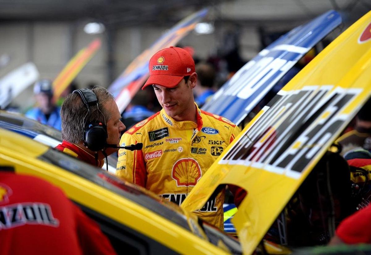 As his season crumbled, NASCAR driver Joey Logano, right, and his Penske Racing team went through an extensive process of elimination to try to find out why their cars were slow.