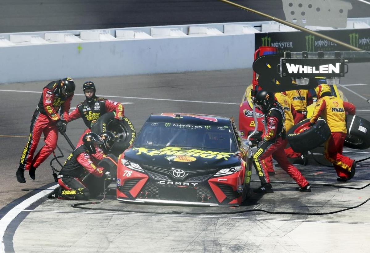 Monster Energy NASCAR Cup Series driver Martin Truex Jr. (78) pits on the 31st lap during Sunday’s race.