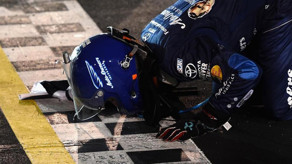 Martin Truex, Jr., driver of the No. 78 Toyota, celebrates after winning the NASCAR Sprint Cup Series Bojangles’ Southern 500 at Darlington Raceway on Sunday.
