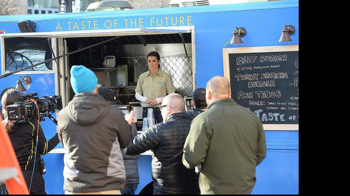 
Filming of Danica Patrick on South Tryon Street in front of the Bechtler Museum on January 28.
