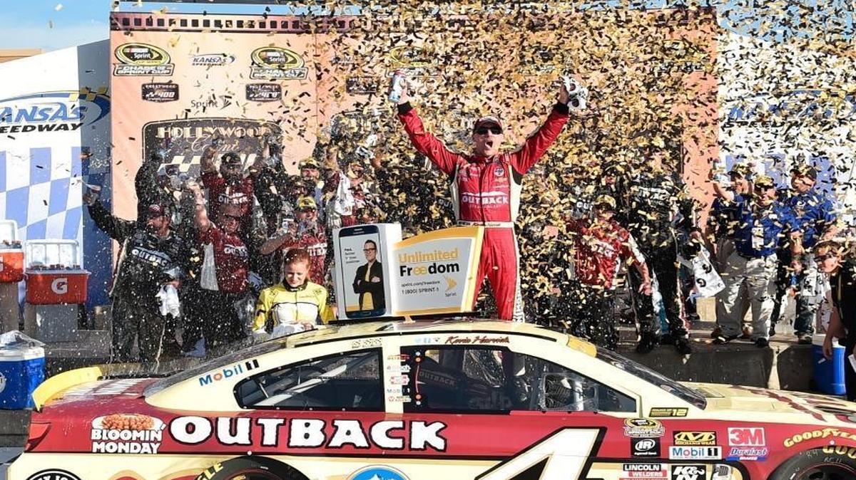 Kevin Harvick won Sunday’s Hollywood Casino 400 at Kansas Speedway, clinching a spot in NASCAR’s Chase round of eight.