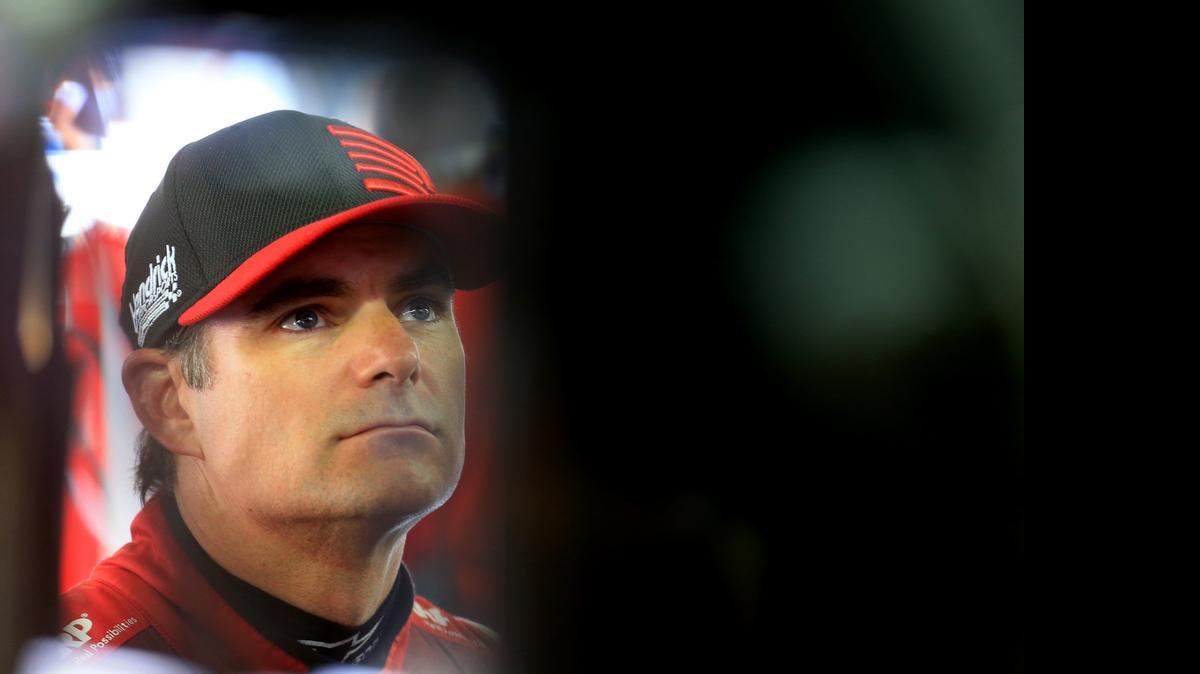 
Jeff Gordon stands in the garage area during practice for the NASCAR Sprint Cup Series Coca-Cola 600 at Charlotte Motor Speedway on Thursday, May 21, 2015 in Concord. 
