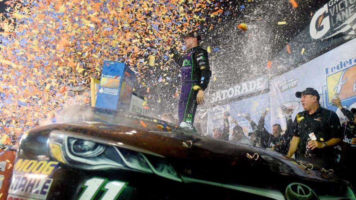 Denny Hamlin celebrates his victory in Saturday’s Federated Auto Parts 400 at Richmond International Raceway.