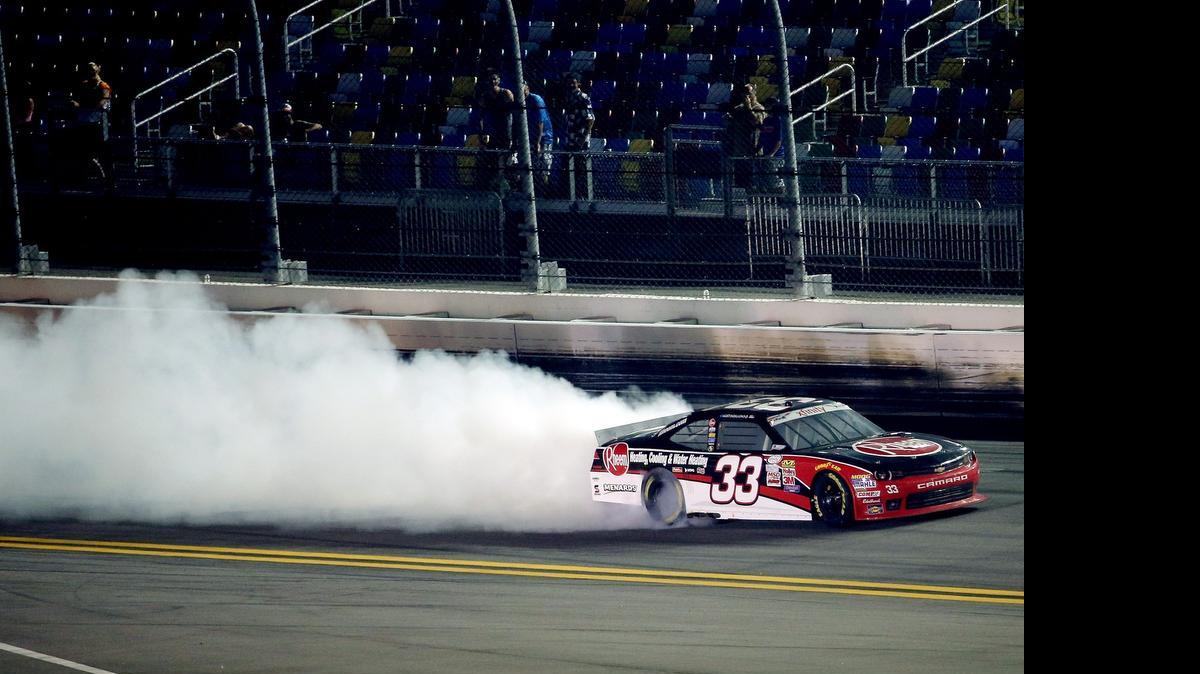 
Austin Dillon (33) outlasted Chase Elliot during a green-white-checkered finish Saturday to claim the crash-filled Subway Firecracker 250 Saturday night at Daytona International Speedway. 

