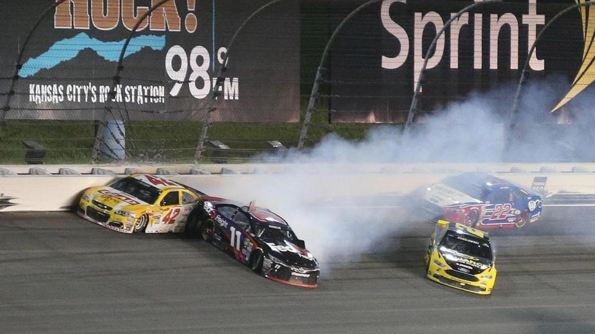 Denny Hamlin (11) wrecks with Brad Keselowski (bottom right), Kyle Larson (42) and Joey Logano (22) at Kansas last week.