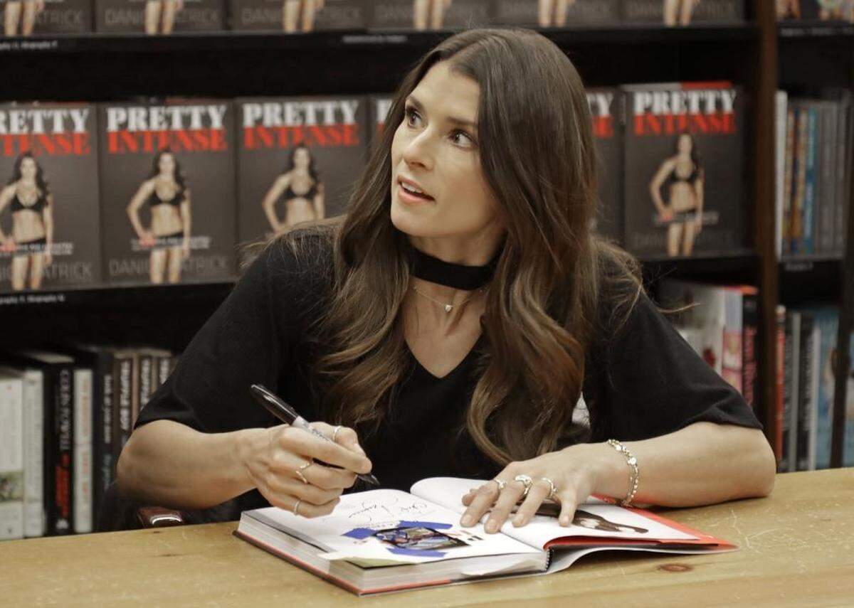 Danica Patrick talks to a fan as she autographs her new book at Barnes & Noble’s Arboretum location on Jan. 4.
