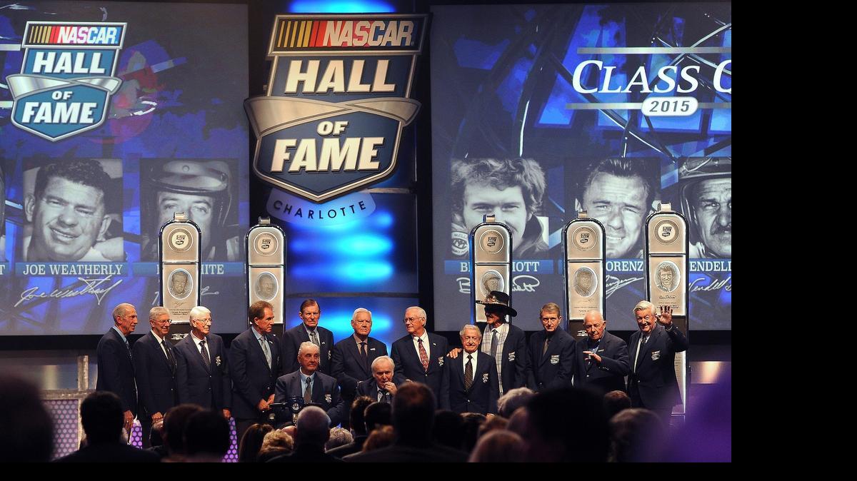 
NASCAR Hall of Fame members stand together on stage following the NASCAR Hall of Fame Class of 2015 Induction Ceremony on Jan. 30, 2015. 

