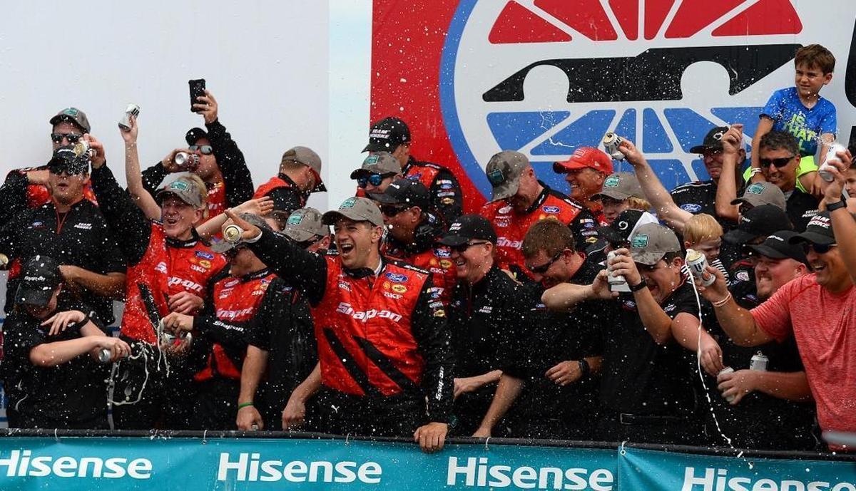 NASCAR Xfinity Series driver Ryan Blaney's team celebrate their victory in Saturday’s Hisense 4K TV 300 at Charlotte Motor Speedway.