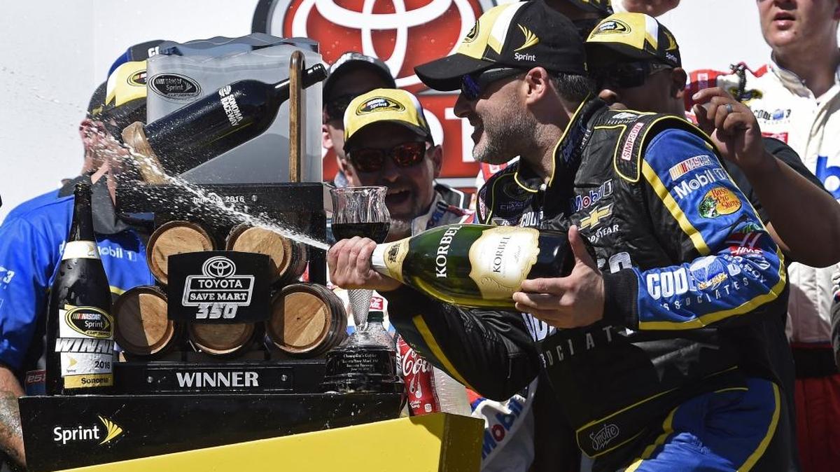 Tony Stewart celebrates his victory Sunday at Sonoma Raceway.