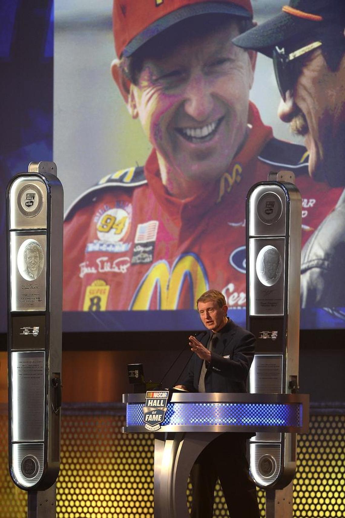 Bill Elliott, former NASCAR Cup Series champion and the father of current NASCAR driver Chase Elliott, addresses the audience after receiving his Hall of Fame ring during his 2015 induction ceremony.