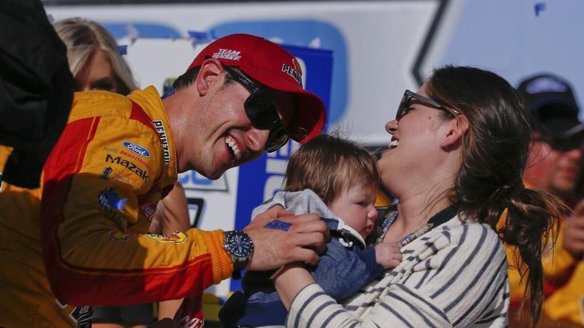 NASCAR driver Joey Logano celebrates in Victory Lane with his family after winning Sunday’s NASCAR Cup Series race at Talladega Superspeedway. Logano has been near the top of the points standings all season, but had just never been able to break through – until this race.