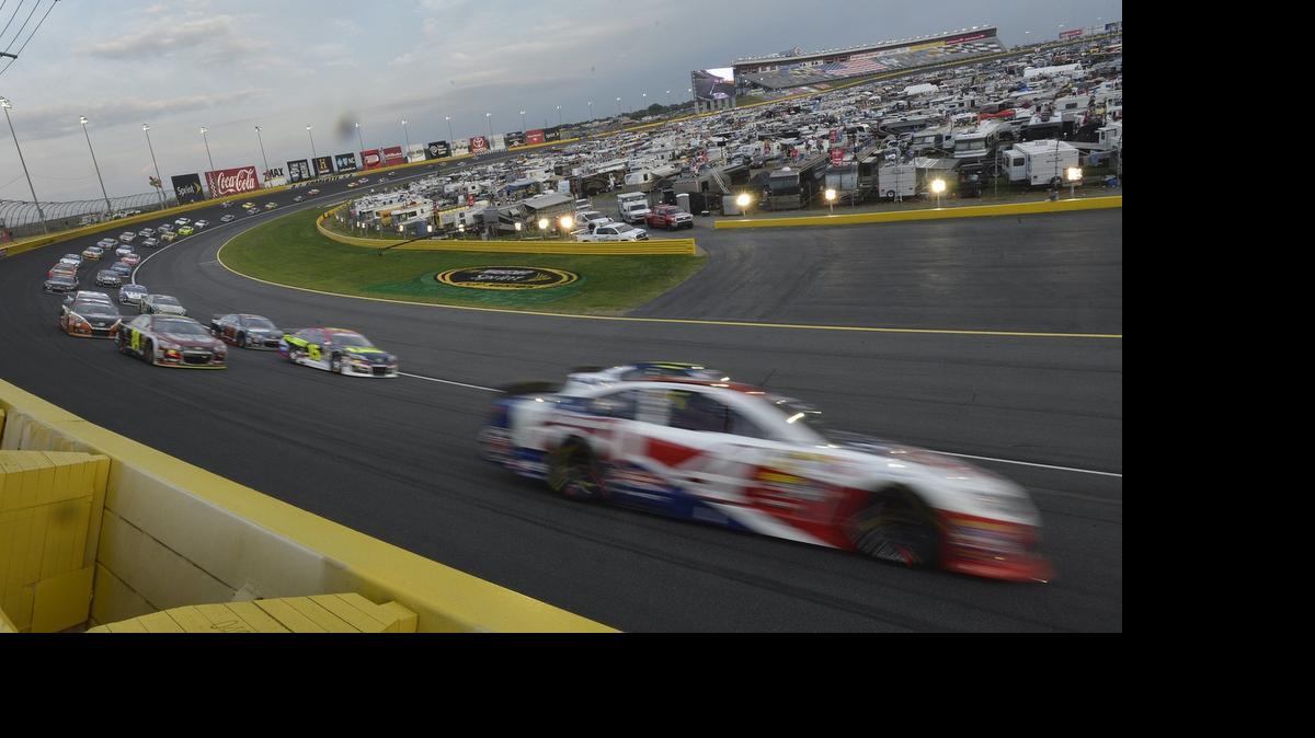 
Kevin Harvick (4) leads the pack through turn 4 during a restart early in the 55th running of the Coca-Cola 600 NASCAR Sprint Cup Race on May 25, 2014 at Charlotte Motor Speedway.
