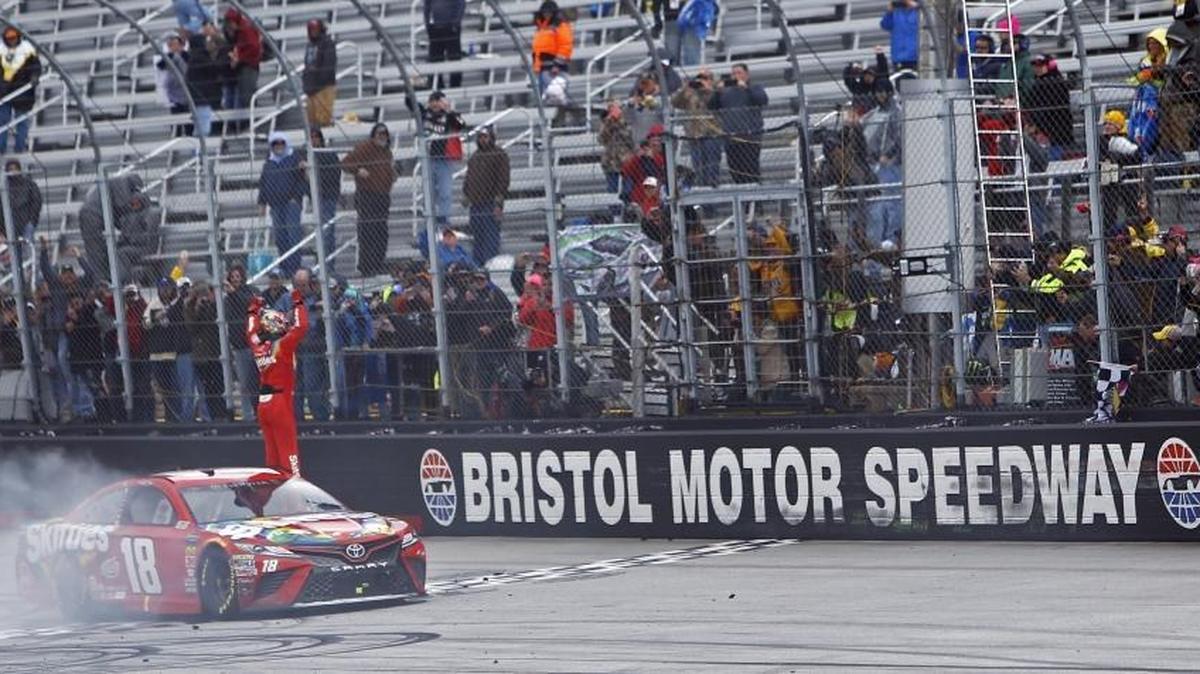 Kyle Busch, already among the best NASCAR Cup Series drivers, is now also the hottest. He celebrates after winning at Bristol Motor Speedway on Monday.